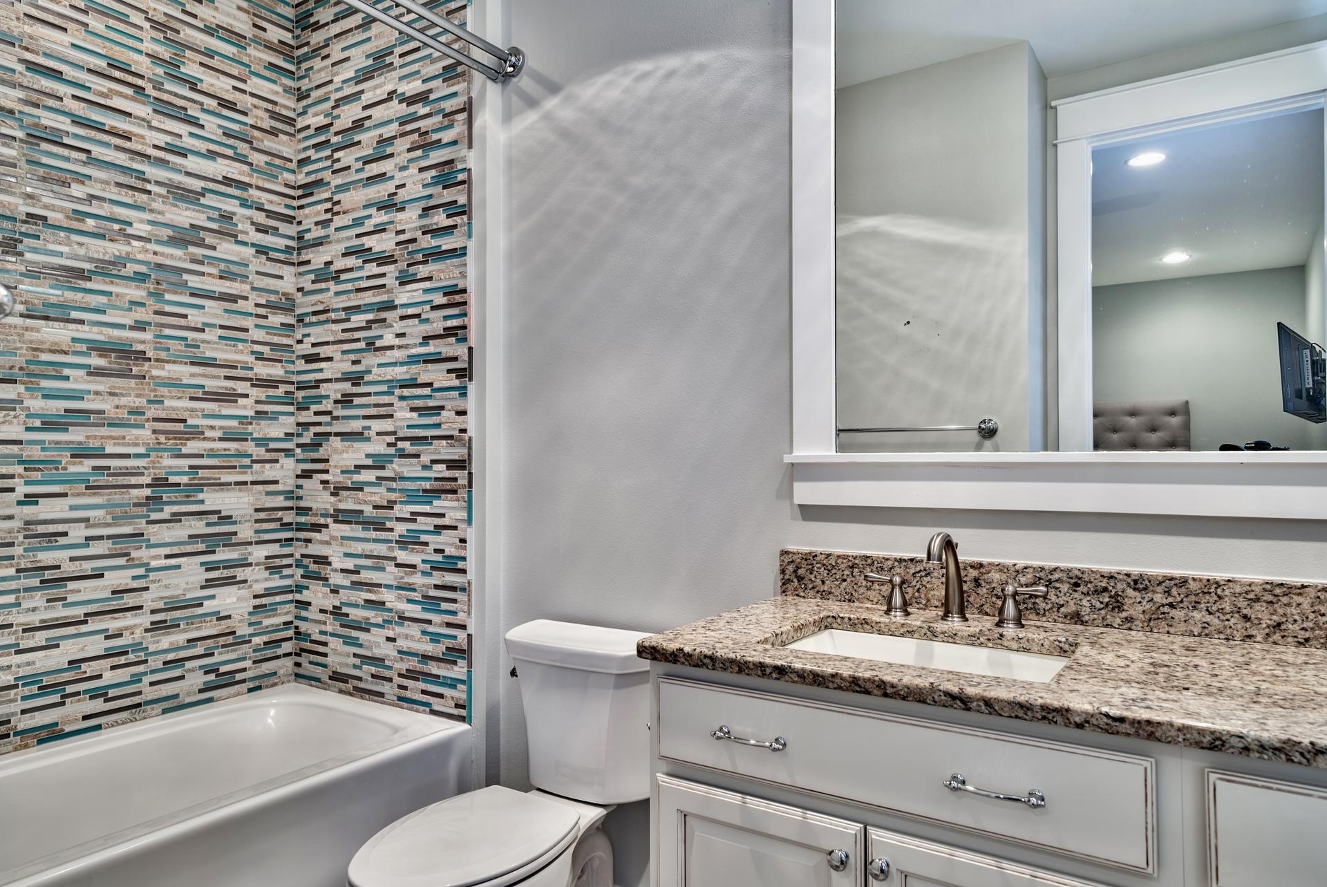 173 Anchor Rode Circle Santa Rosa Beach, FL 32459 - Photo 20 of 35 a bathroom with a granite countertop sink toilet and shower