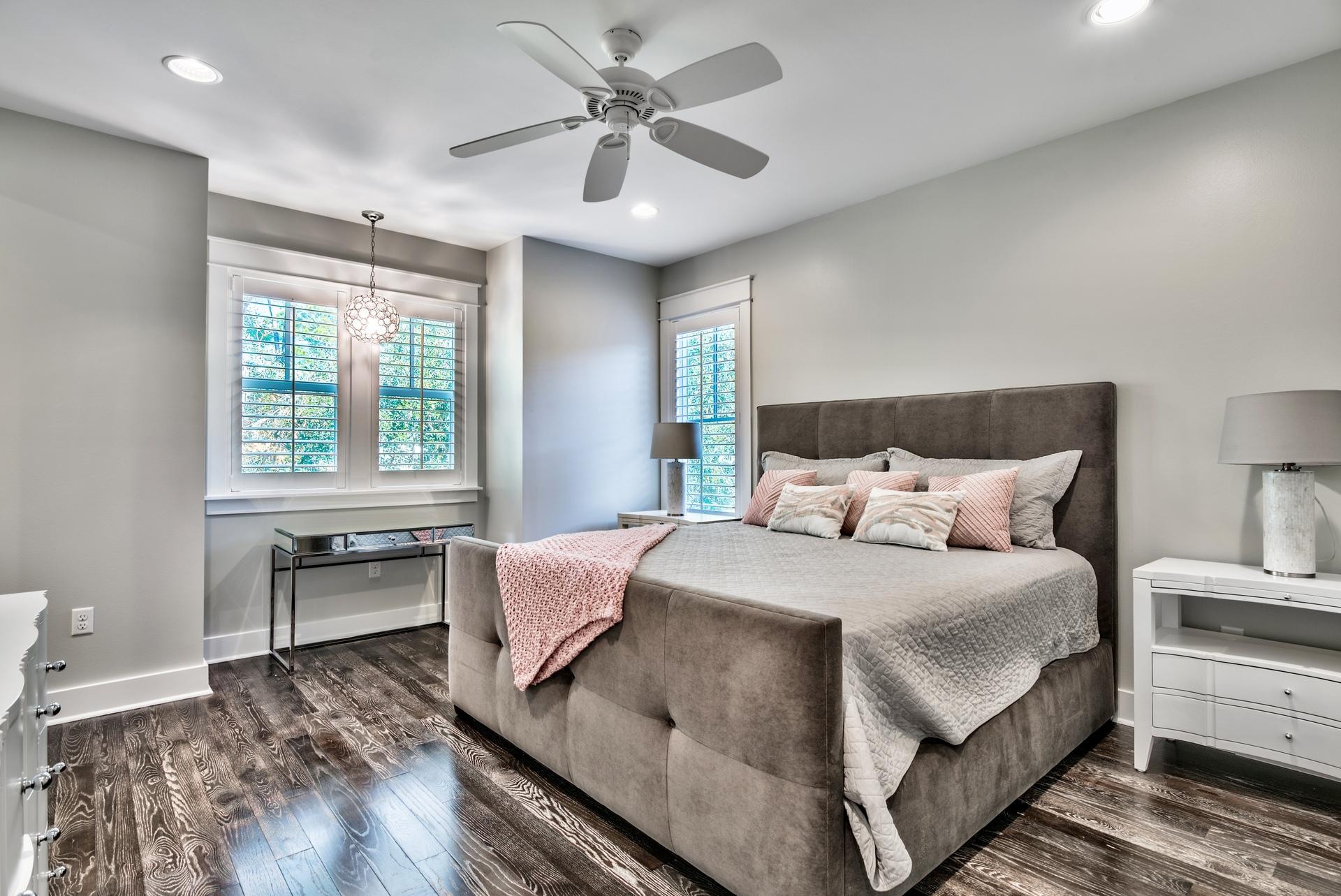 173 Anchor Rode Circle Santa Rosa Beach, FL 32459 - Photo 21 of 35 a bedroom with a large bed and a chandelier