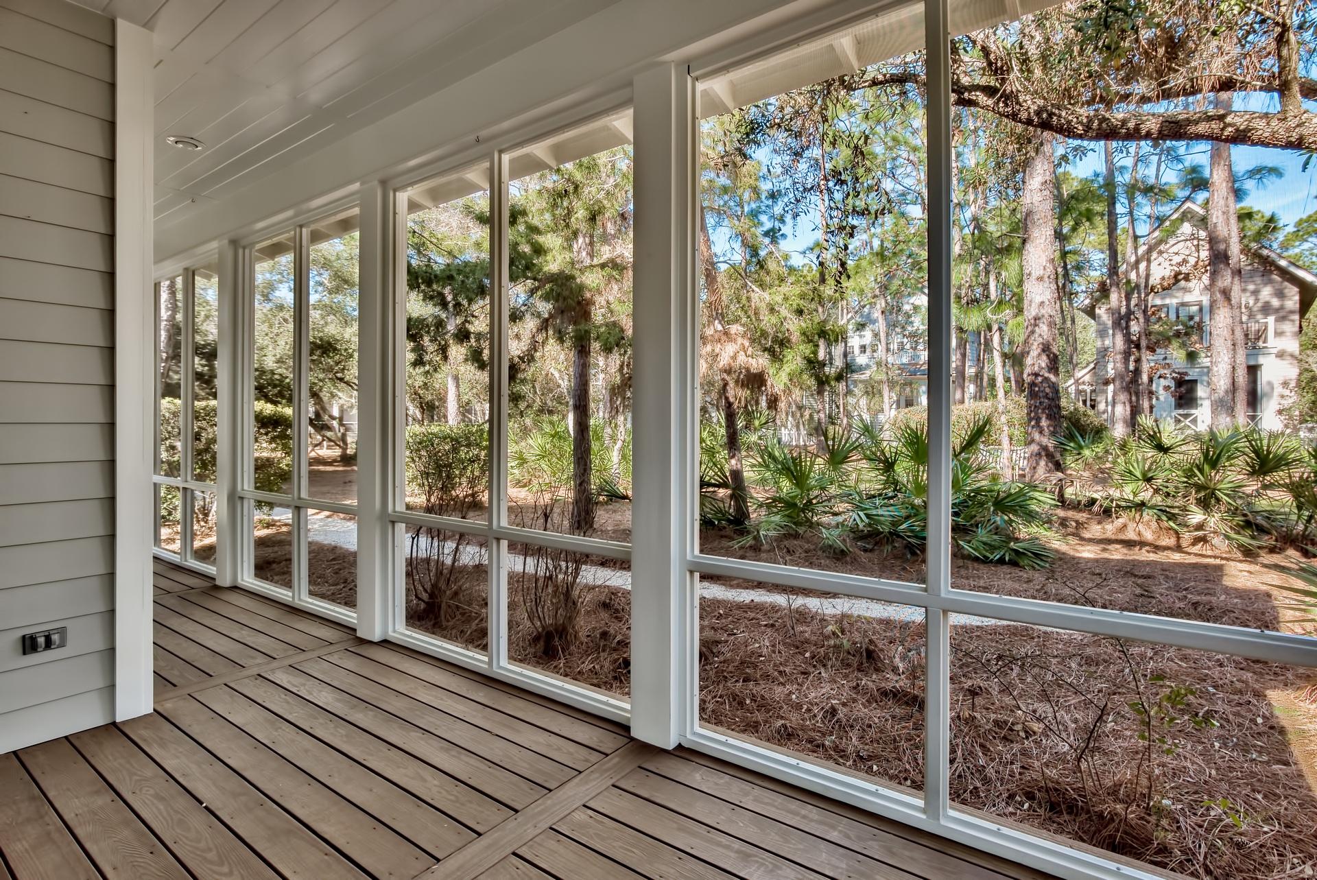 173 Anchor Rode Circle Santa Rosa Beach, FL 32459 - Photo 26 of 35 a view of a room with floor to ceiling windows with wooden floor