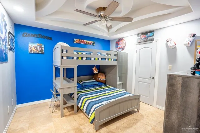 a bedroom with a bed and a table