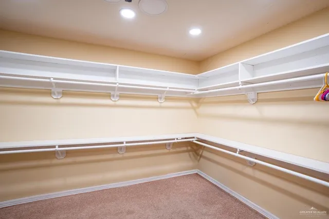 a view of a room with racks on the wall