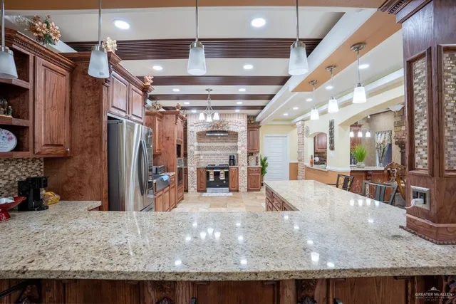 a view of a hallway with a chair and table