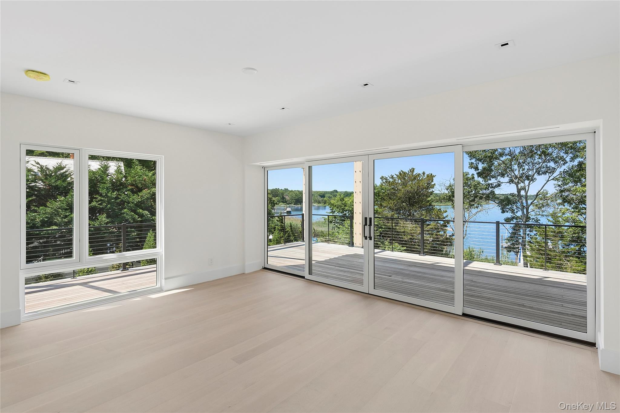 25 Bluff Point Road Sag Harbor, NY 11963 - Photo 19 of 27 Primary Bedroom