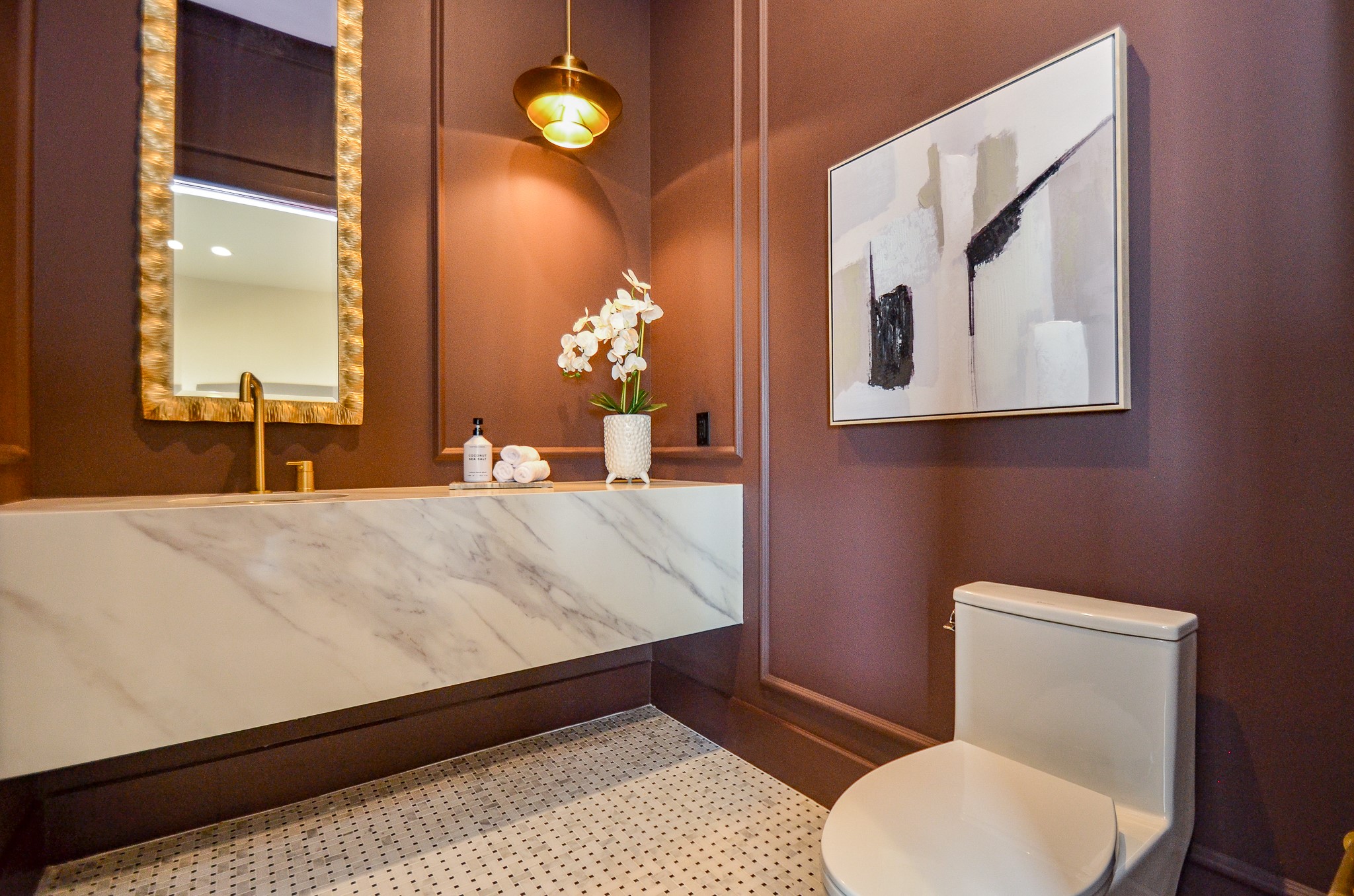 20218 Tealpointe Ridge Lane Tomball, TX 77377 - Photo 11 of 50 a bathroom with a toilet sink and mirror