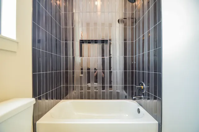 a bathroom with a bathtub