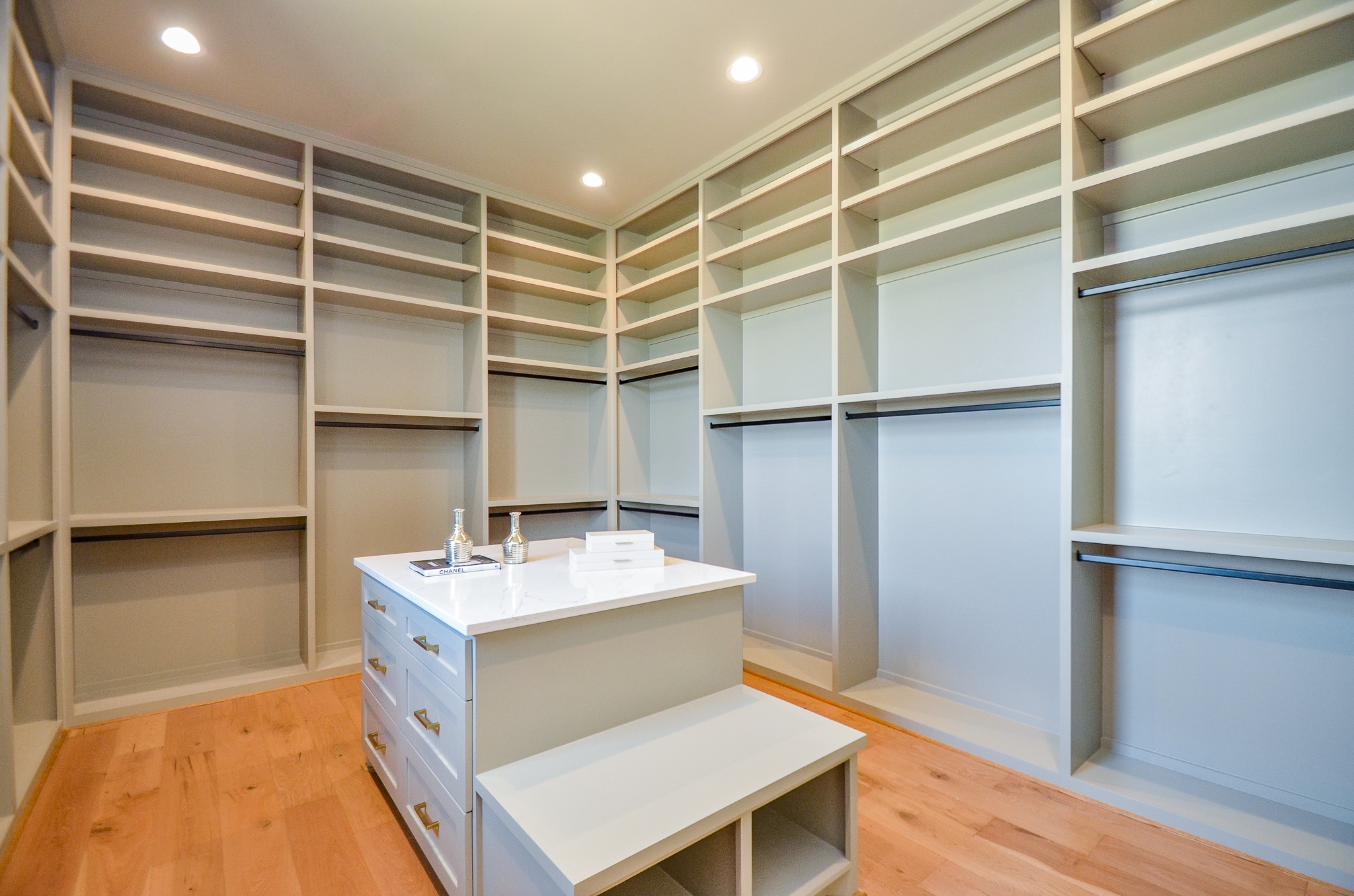 20218 Tealpointe Ridge Lane Tomball, TX 77377 - Photo 13 of 50 a room with a cabinets and a wooden floor
