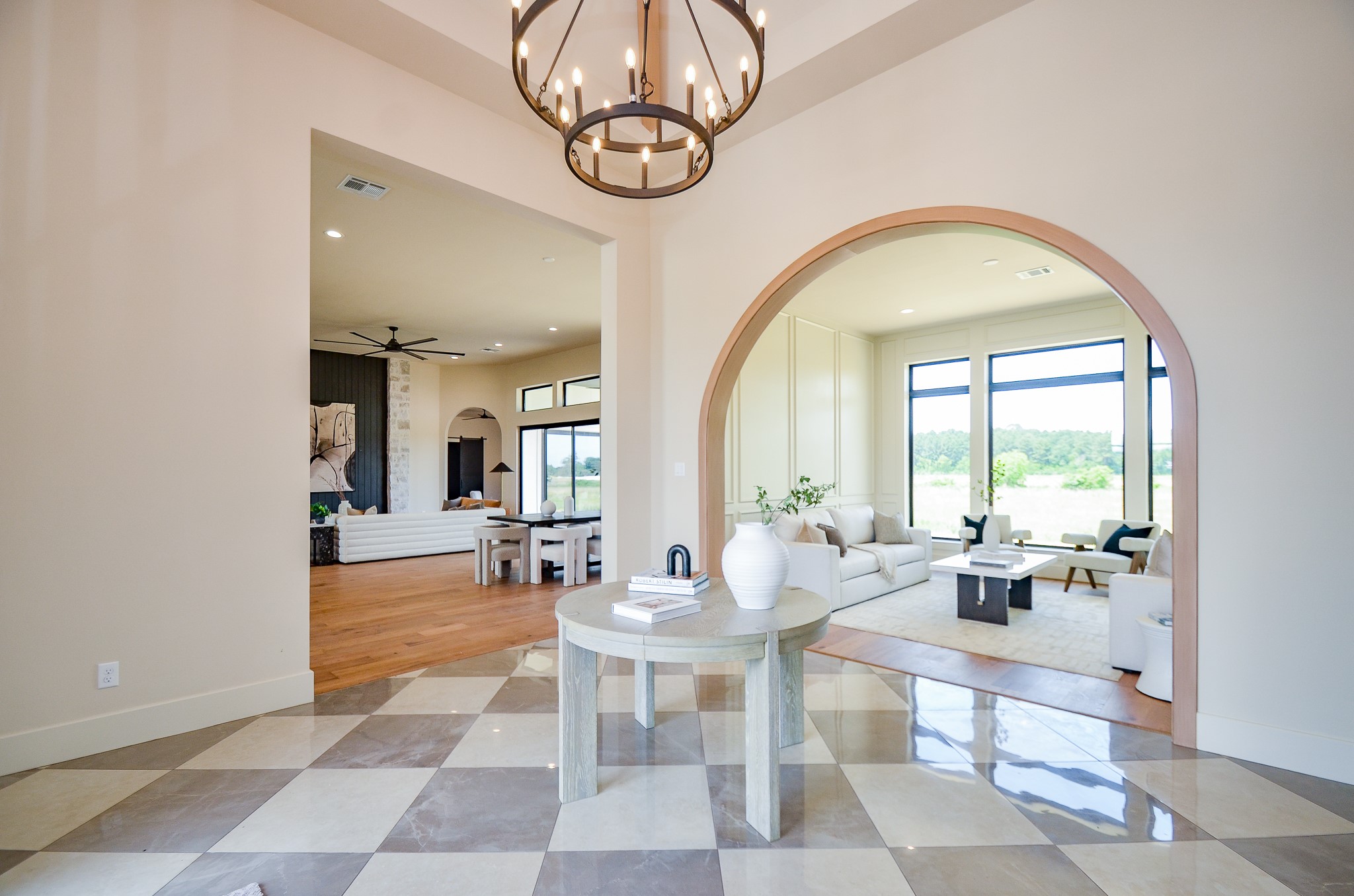 20218 Tealpointe Ridge Lane Tomball, TX 77377 - Photo 22 of 50 a living room with fireplace furniture and a large window