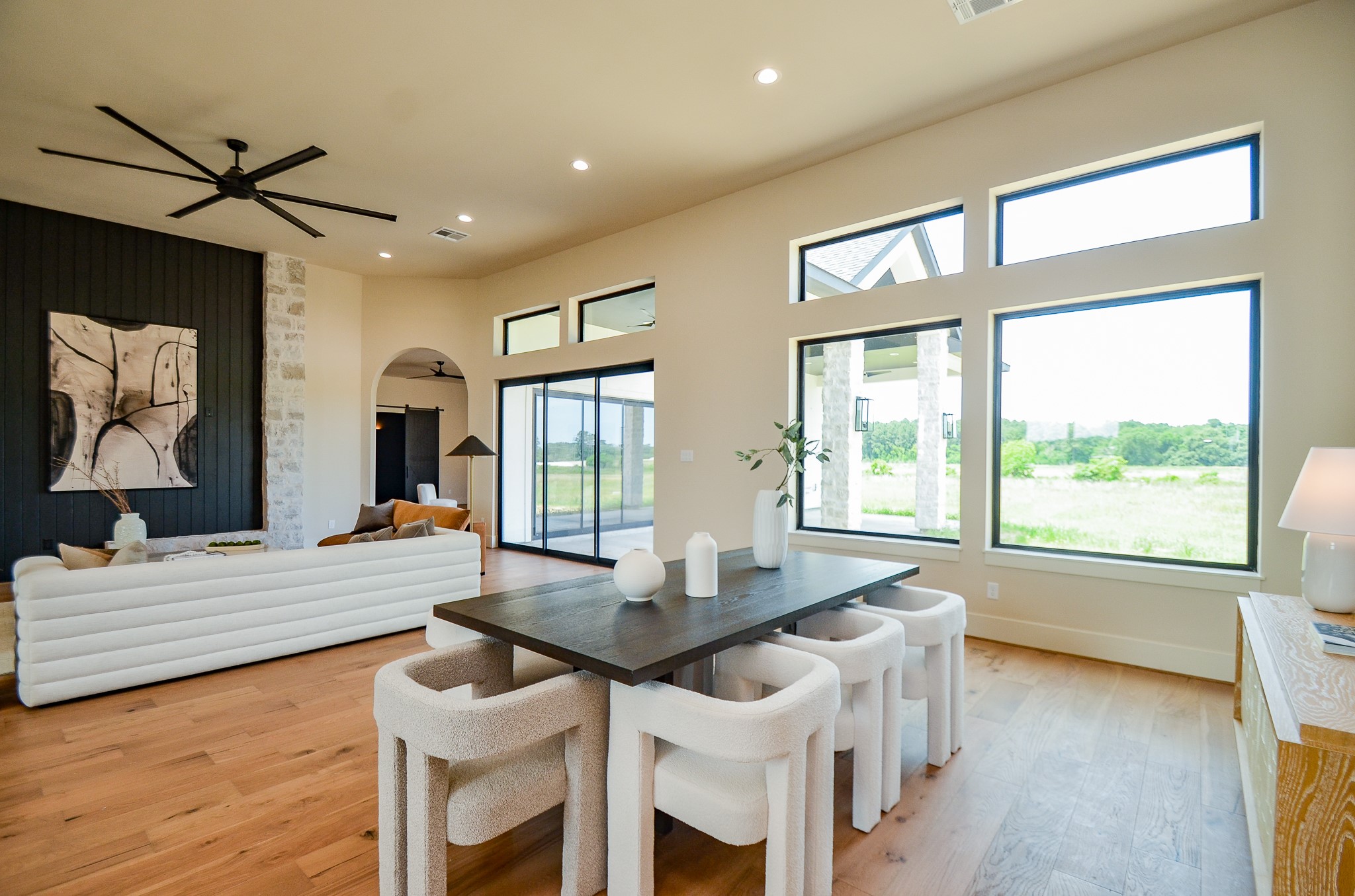 20218 Tealpointe Ridge Lane Tomball, TX 77377 - Photo 37 of 50 a view of a dining room with furniture window and wooden floor