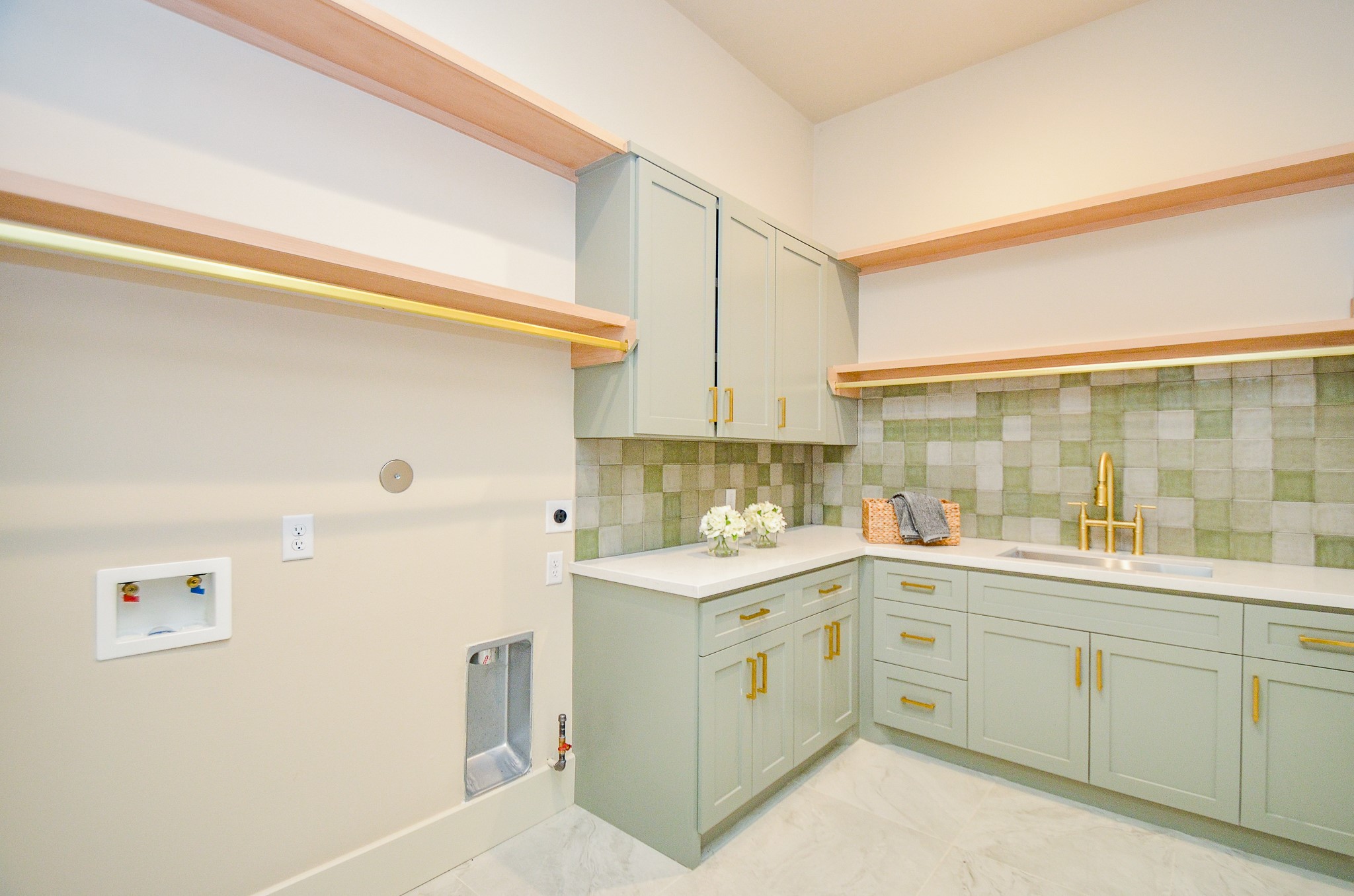 20218 Tealpointe Ridge Lane Tomball, TX 77377 - Photo 40 of 50 a kitchen with a sink a stove and cabinets