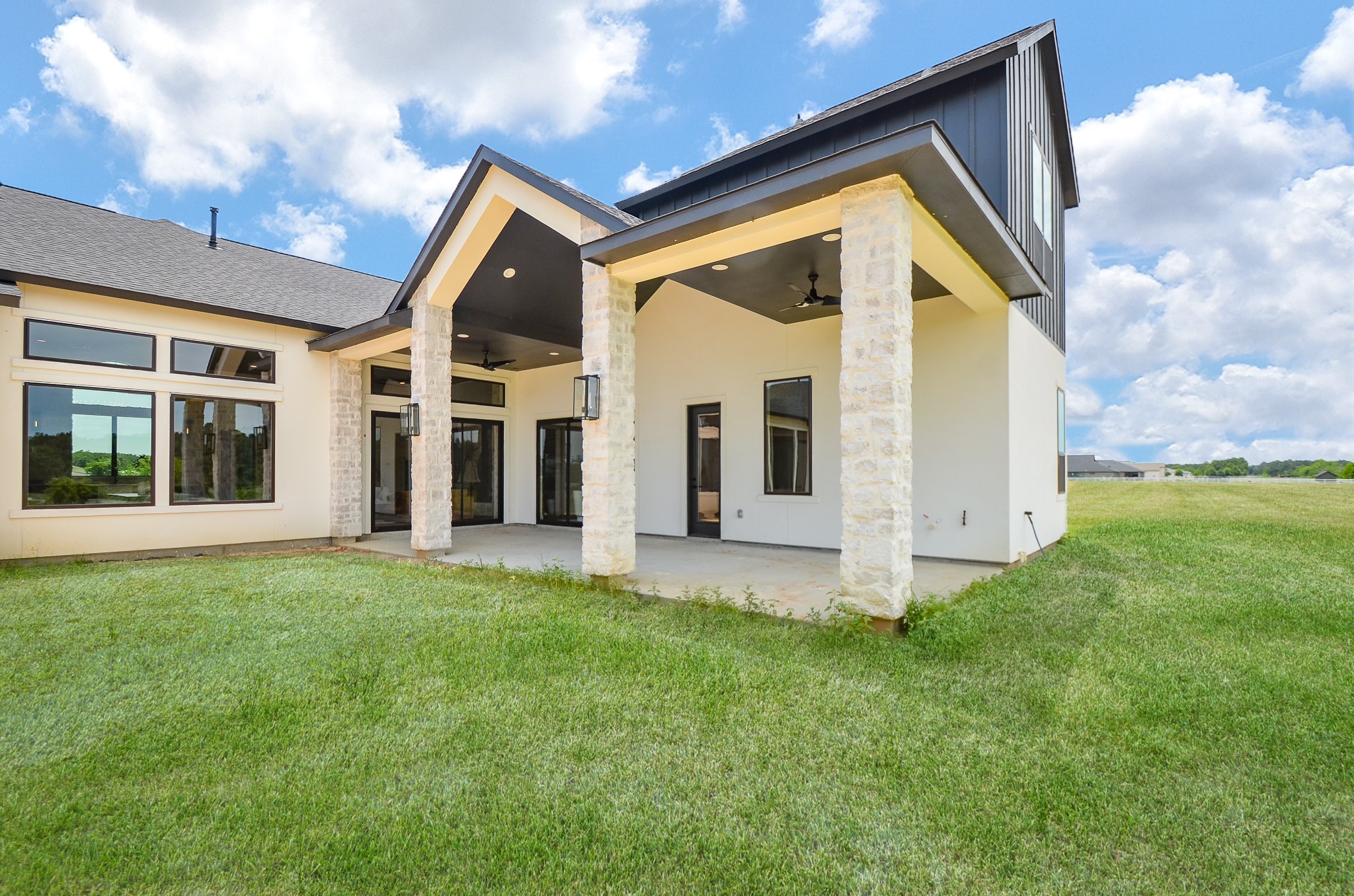 20218 Tealpointe Ridge Lane Tomball, TX 77377 - Photo 6 of 50 a view of a house with backyard and porch