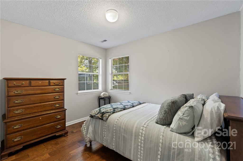 10637 Fairway Ridge Road Charlotte, NC 28277 - Photo 14 of 24 a bedroom with a bed and a window
