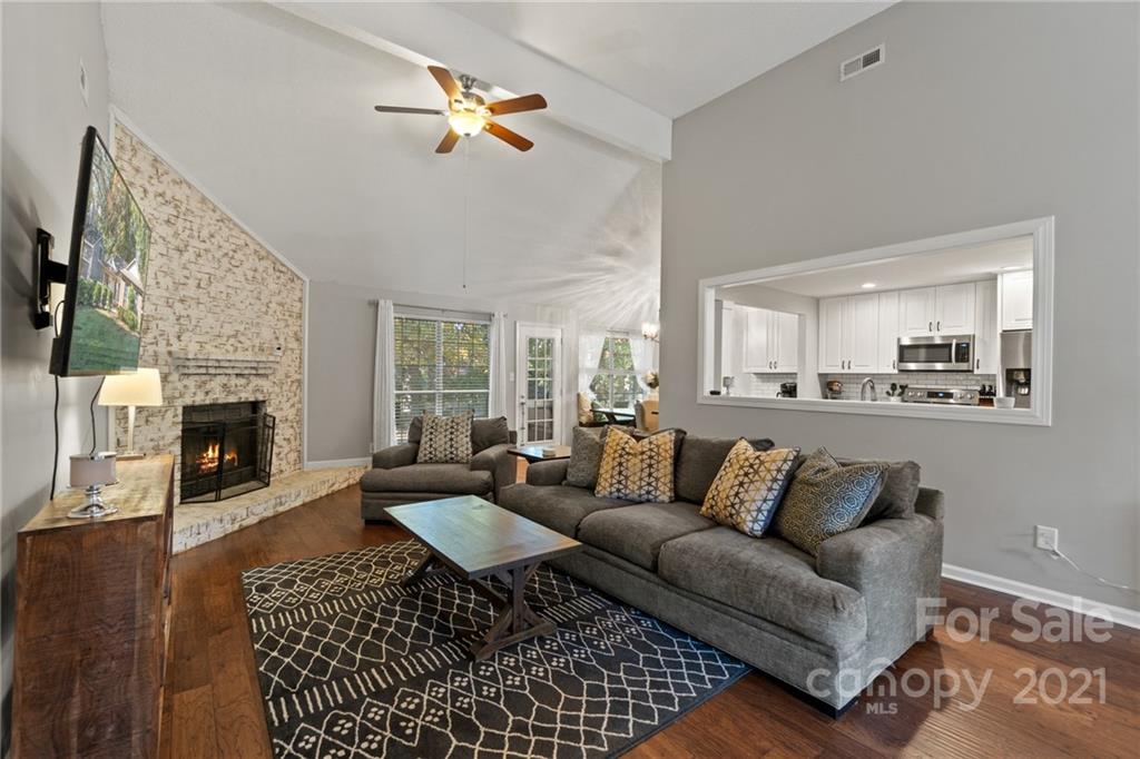 10637 Fairway Ridge Road Charlotte, NC 28277 - Photo 8 of 24 a living room with furniture and a fireplace