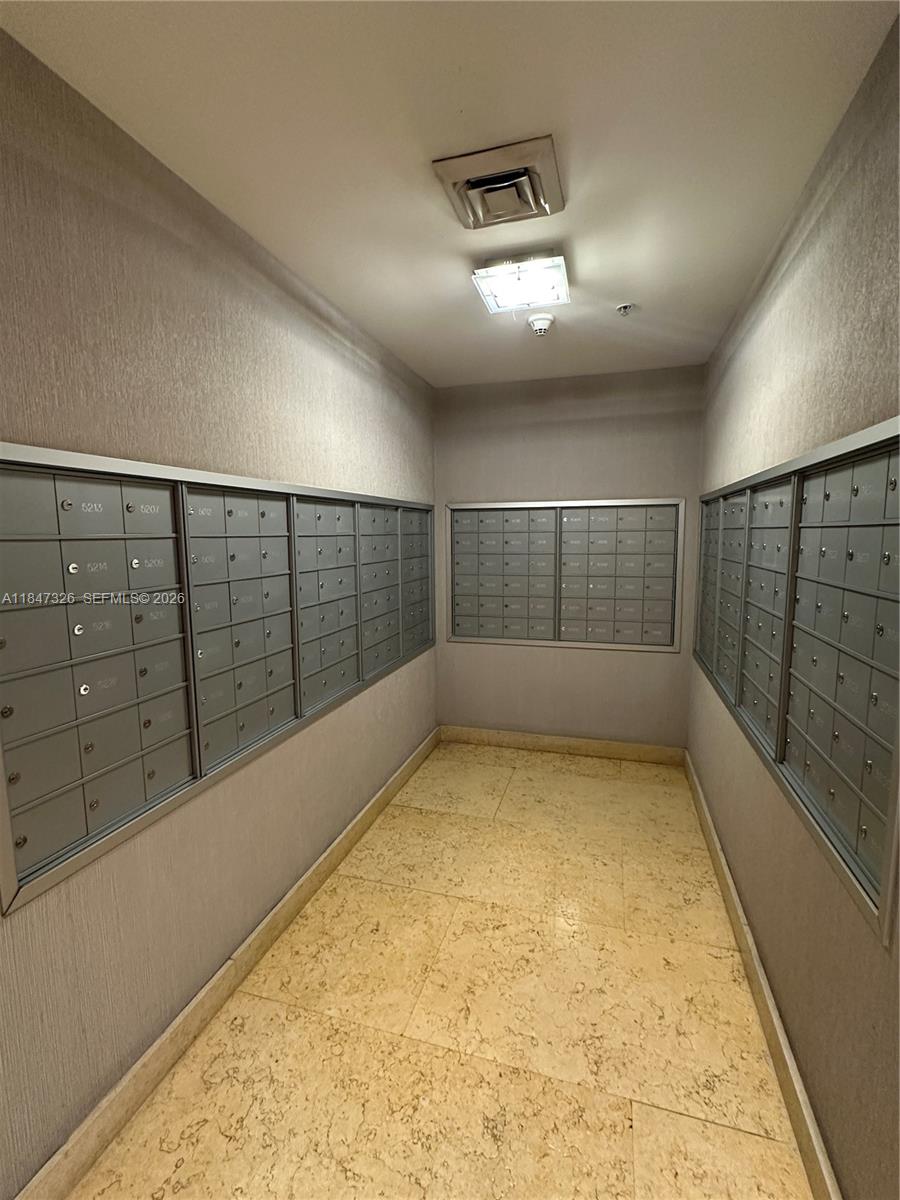 60 Southwest 13th Street, Unit 1605 Miami, FL 33130 - Photo 20 of 25 wooden floor with window in room