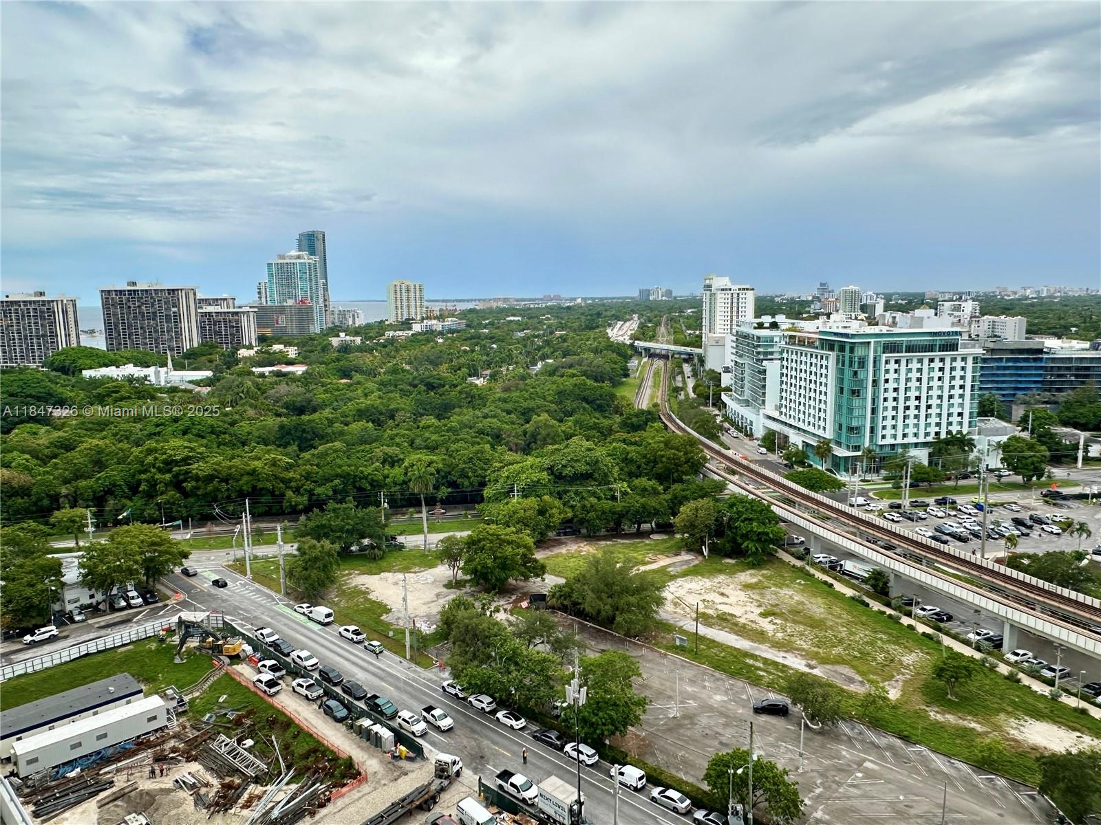 60 Southwest 13th Street, Unit 1605 Miami, FL 33130 - Photo 3 of 28 a view of a city with tall buildings