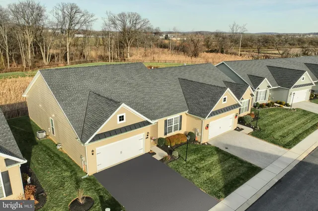 an aerial view of residential house with outdoor space