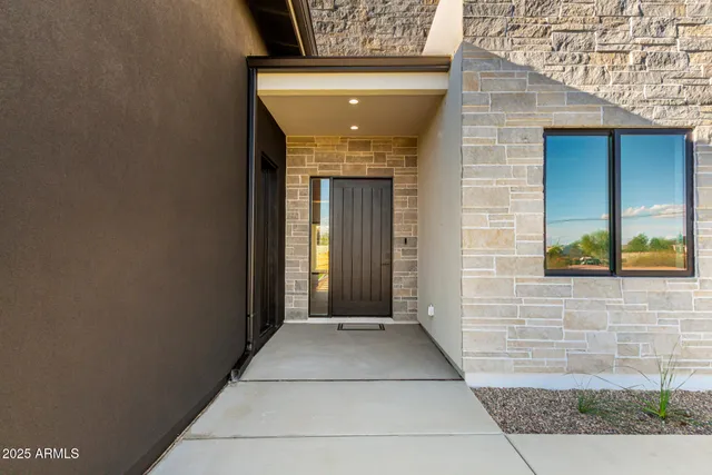 a kitchen with a stove and a sink