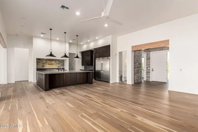 a bathroom with a tub sink and shower