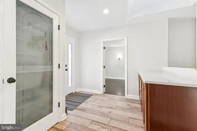 a bathroom with a sink and a shower