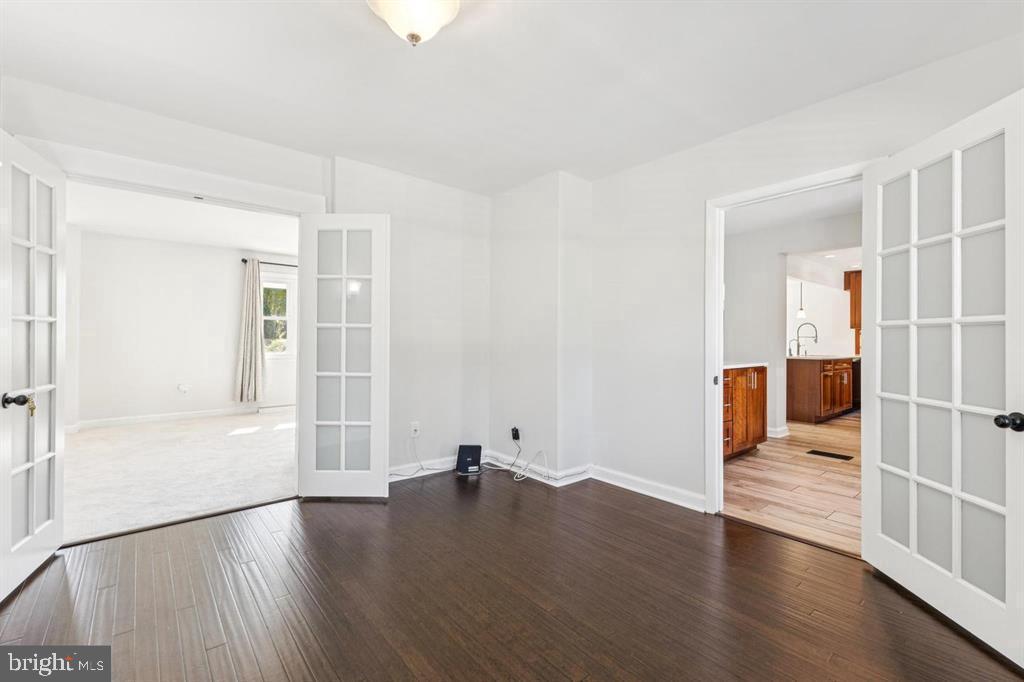 22810 Ridge Road Clarksburg, MD 20871 - Photo 13 of 34 wooden floor in an empty room with a window