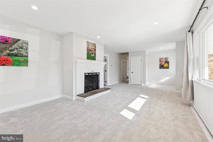 22810 Ridge Road Clarksburg, MD 20871 - Photo 2 of 34 an empty room with windows and fireplace