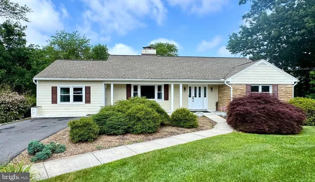a view of a house with a garden