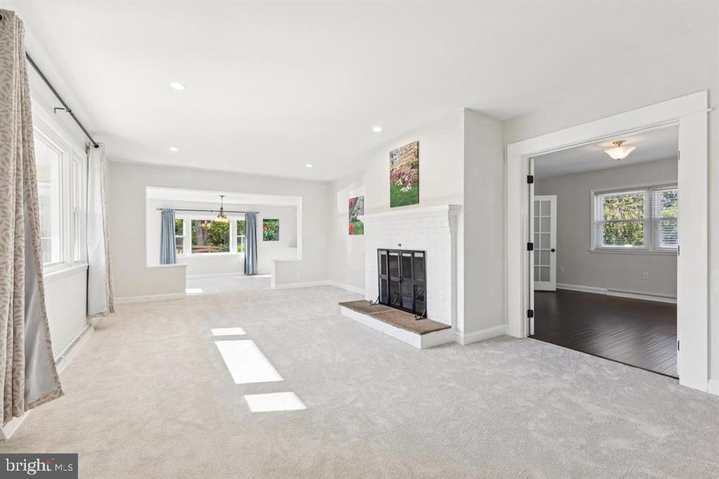 22810 Ridge Road Clarksburg, MD 20871 - Photo 5 of 34 an empty room with windows and fireplace