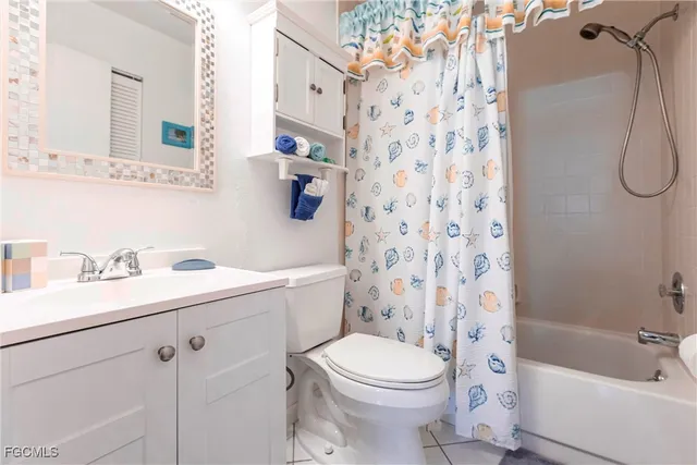 a bathroom with a sink a toilet and a bathtub
