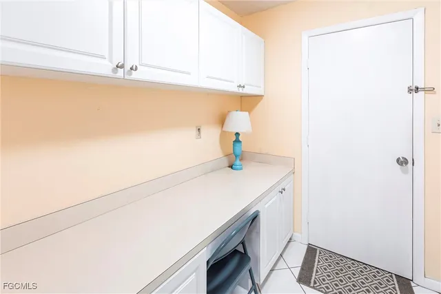 a bathroom with a sink and a window