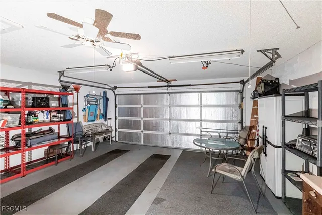 a room with gym equipment and a window