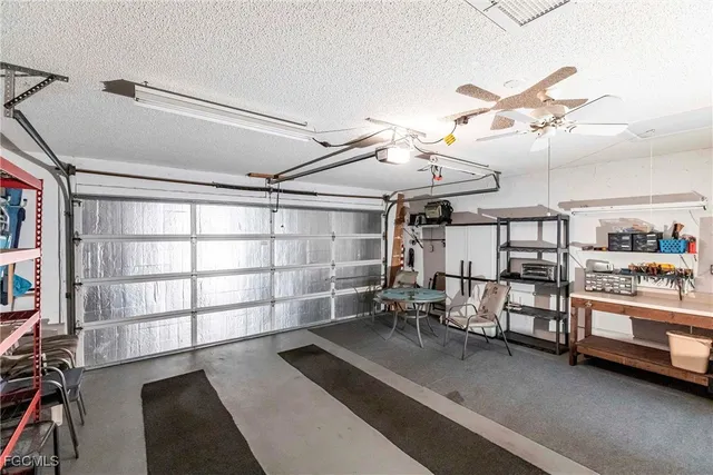 a view of a livingroom with furniture and a window