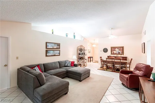 a living room with furniture and a couch