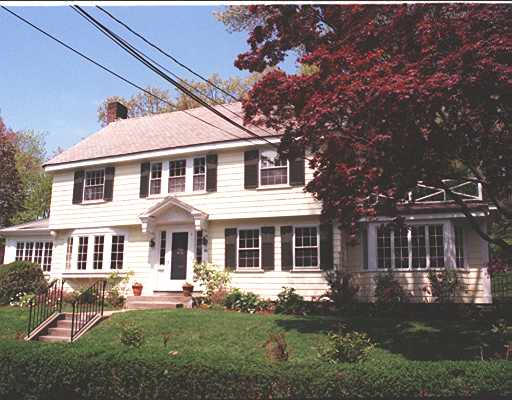 42 Howland Road Newton, MA 02465 - Photo 1 of 1 front view of a house with a yard