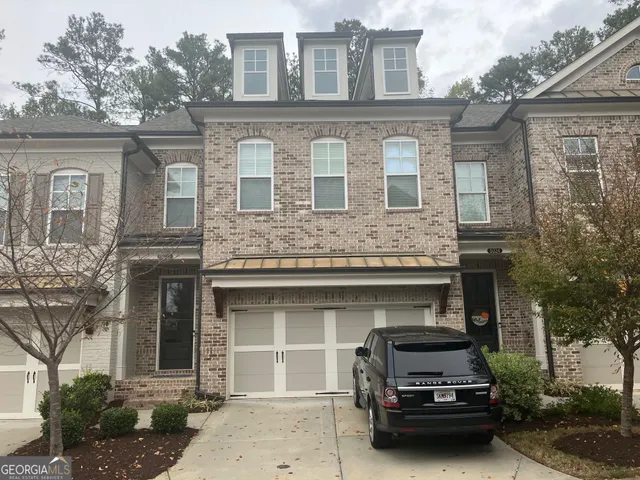 a car parked in front of a building