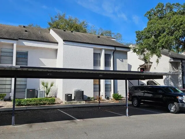 a car parked in front of a house