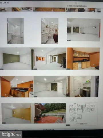 a view of living room filled with furniture and baby crib