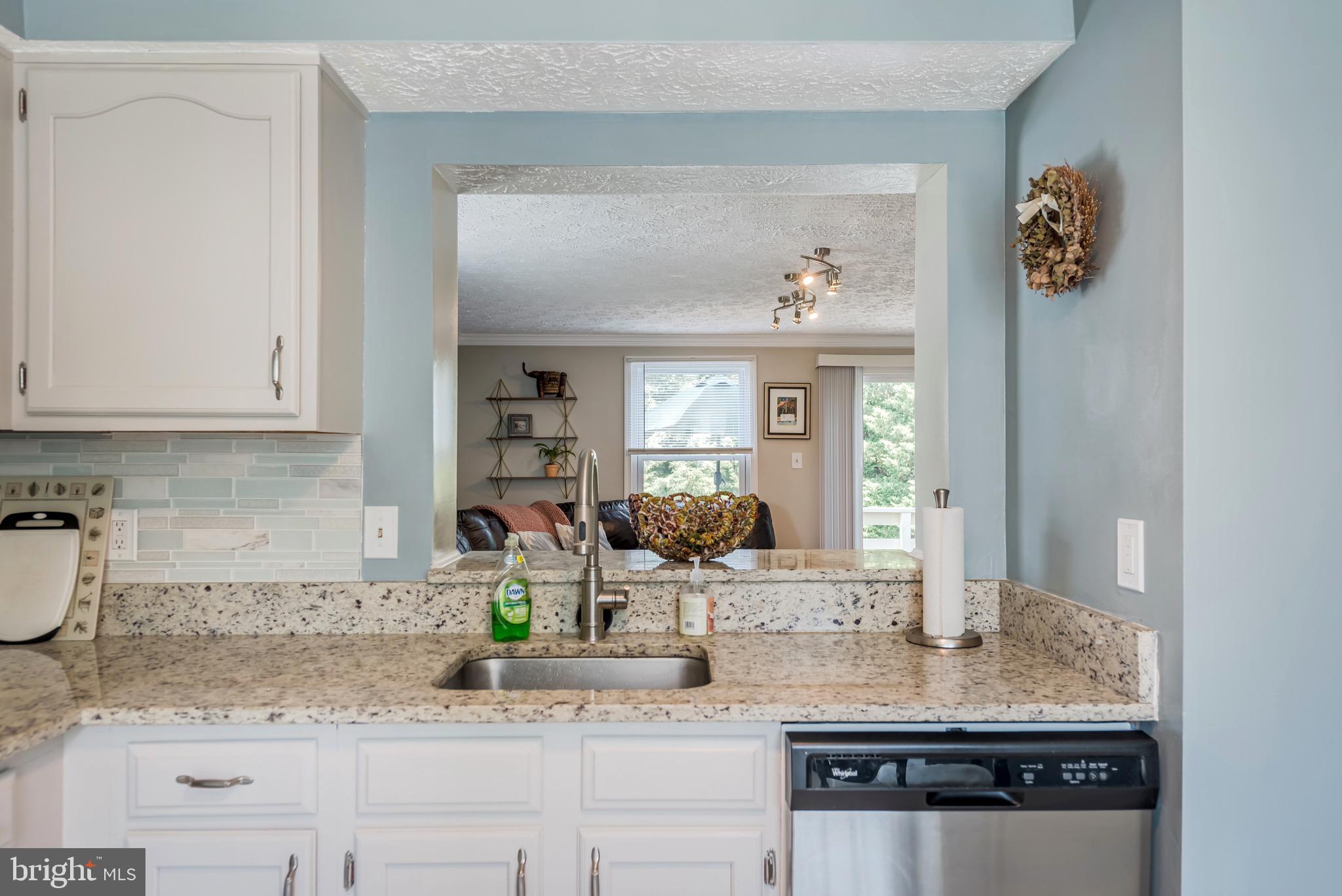 1701 Sundance Drive Reston, VA 20194 - Photo 6 of 24 Awesome segway from the kitchen to the living area