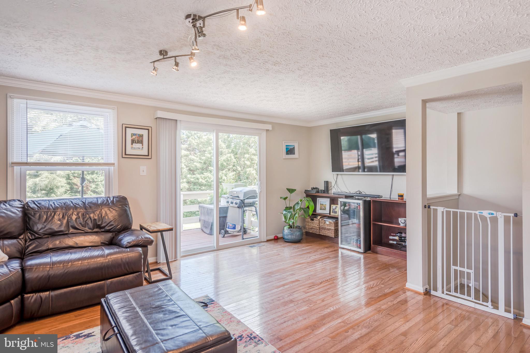 1701 Sundance Drive Reston, VA 20194 - Photo 8 of 24 Peace and privacy awaits on the mid-level deck!