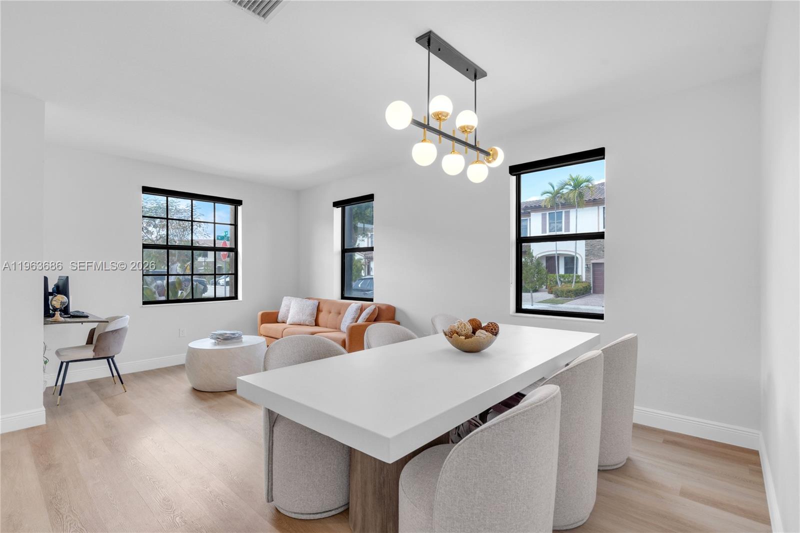 9393 West 33rd Way Hialeah, FL 33018 - Photo 6 of 33 dining/living