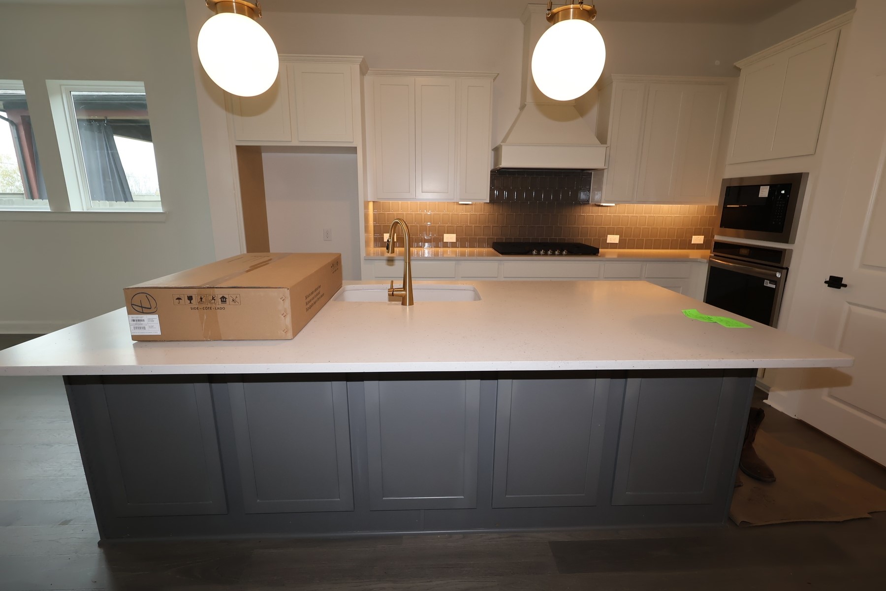 5614 Orangery Lane Manvel, TX 77578 - Photo 6 of 19 a kitchen with a sink cabinets and window