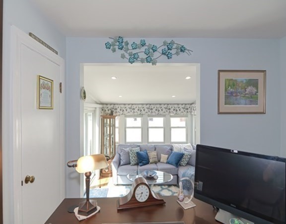 61 Arnold Road Quincy, MA 02171 - Photo 12 of 33 a living room with furniture a window and a potted plant