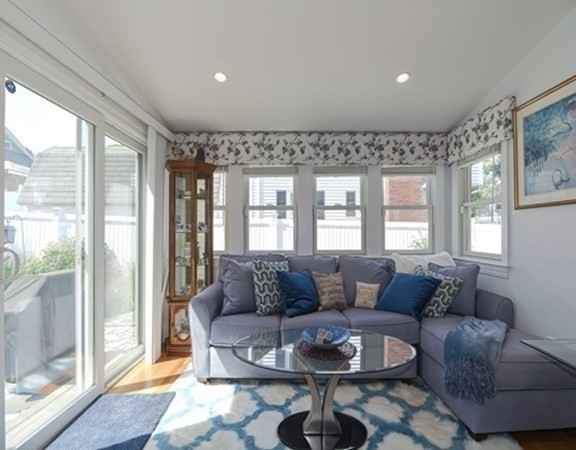 61 Arnold Road Quincy, MA 02171 - Photo 13 of 33 a living room with furniture and a large window