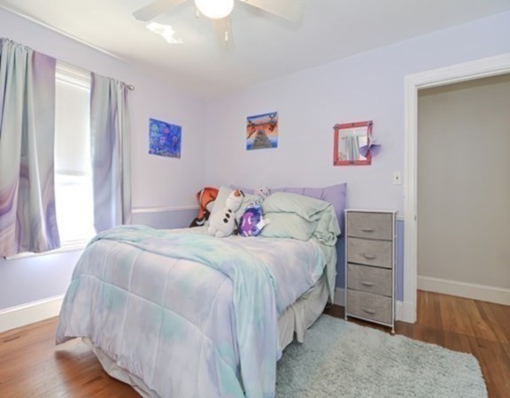 61 Arnold Road Quincy, MA 02171 - Photo 16 of 33 a bedroom with a bed and a window