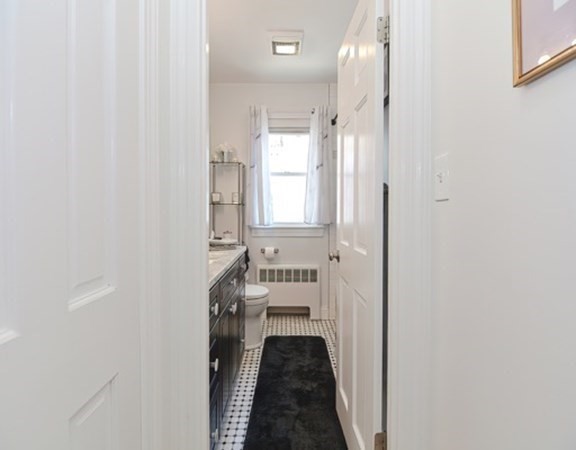 61 Arnold Road Quincy, MA 02171 - Photo 18 of 33 a view of a hallway with windows