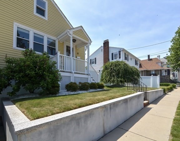 61 Arnold Road Quincy, MA 02171 - Photo 2 of 33 a view of house with yard and lake view