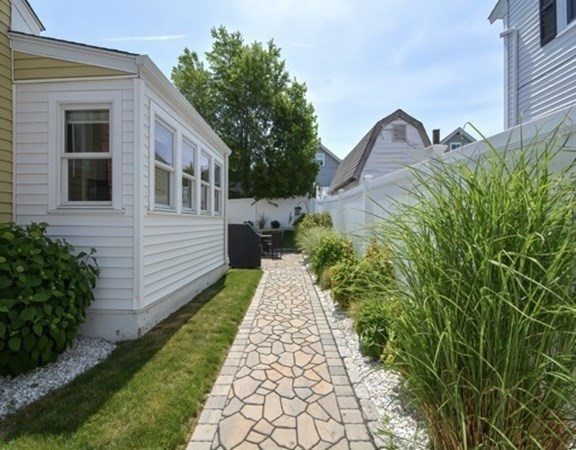 61 Arnold Road Quincy, MA 02171 - Photo 29 of 33 a view of a garden with pathway