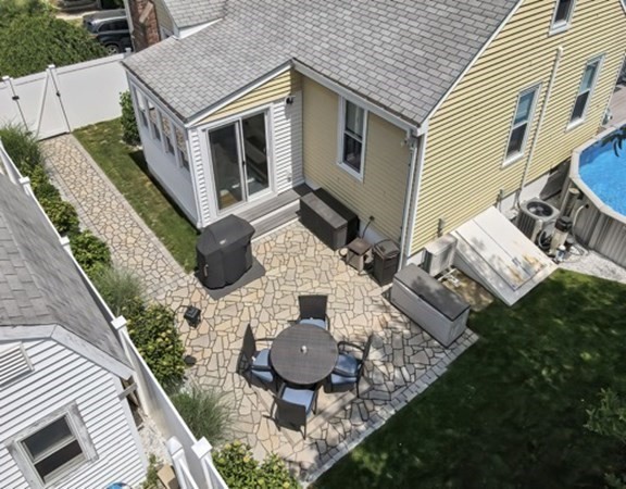 61 Arnold Road Quincy, MA 02171 - Photo 30 of 33 a aerial view of a house with yard and furniture