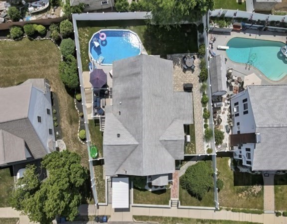 61 Arnold Road Quincy, MA 02171 - Photo 33 of 33 an aerial view of a house with a swimming pool