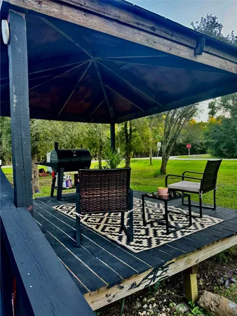 a sitting area with furniture and outdoor view