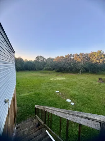 a view of a terrace with a yard
