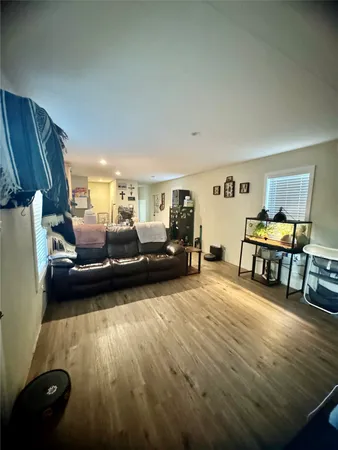 a living room with furniture and a couch